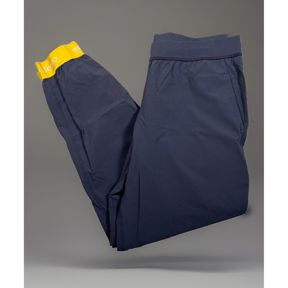 Cotopaxi Womens Medium Ara Jogger Pants Navy Blue Yellow Cuffs Stretch Athletic